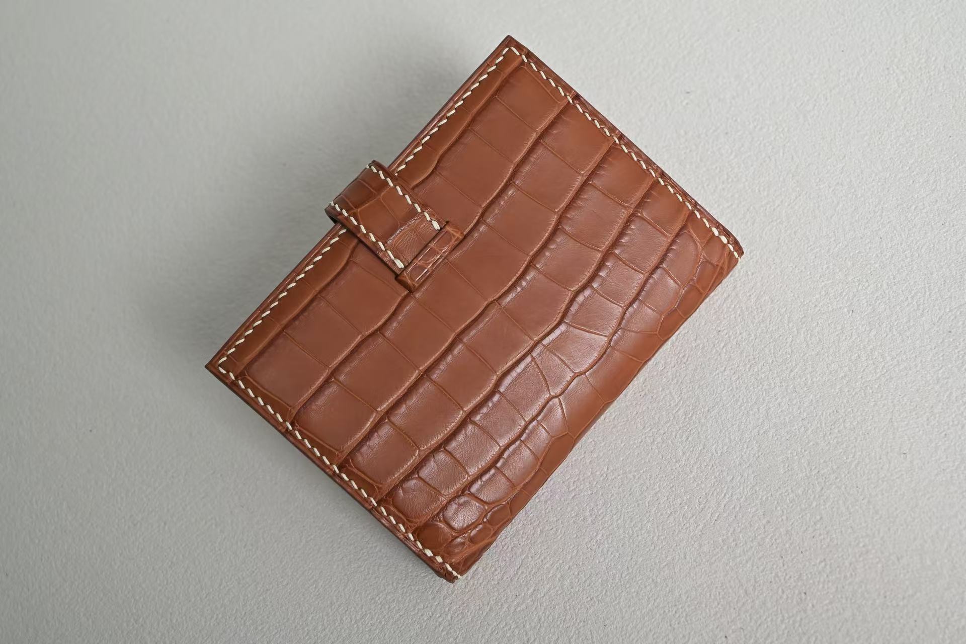 Brown genuine crocodile leather coin purse with cream contrast stitching