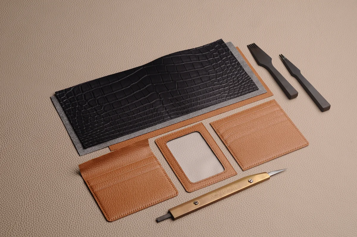 Leather panels and tools prepared for construction
