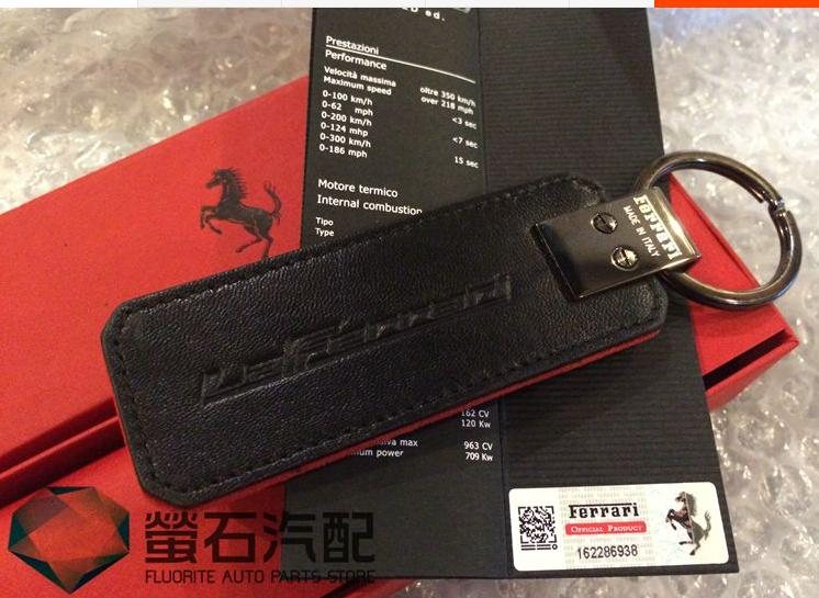 Black leather key holder with branded packaging