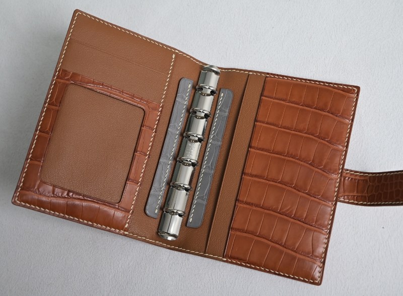 Open leather ring organizer with card pockets and metal rings