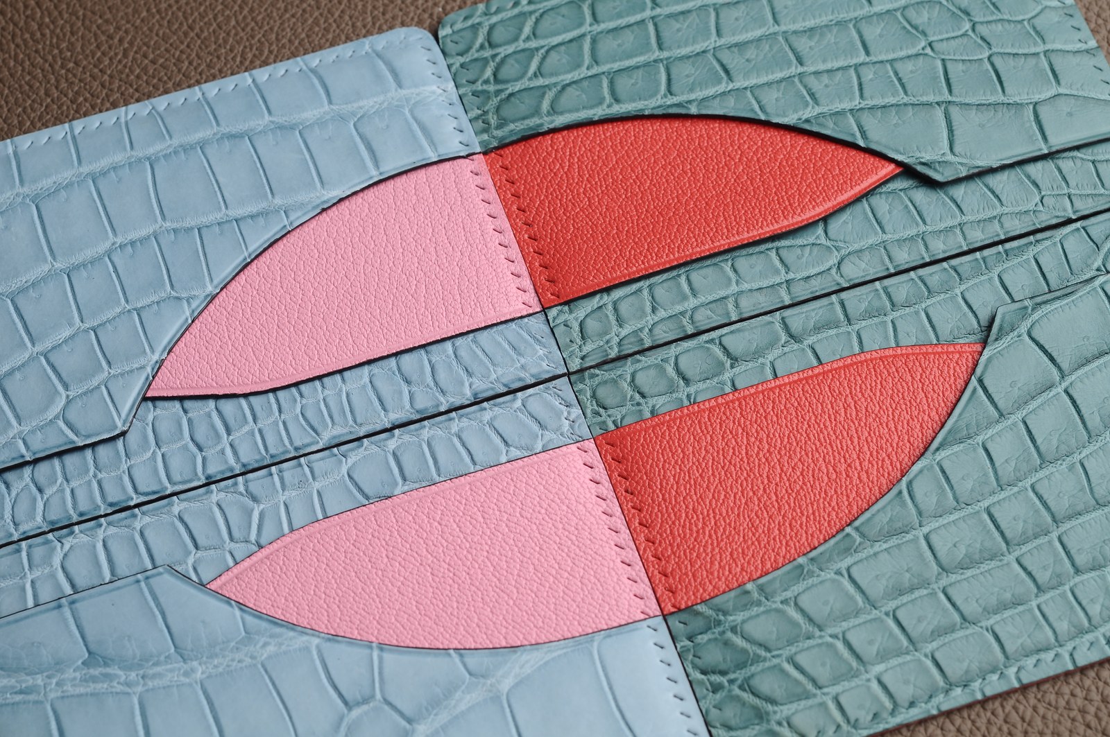Light blue crocodile leather card holder components with pink and coral curved pockets