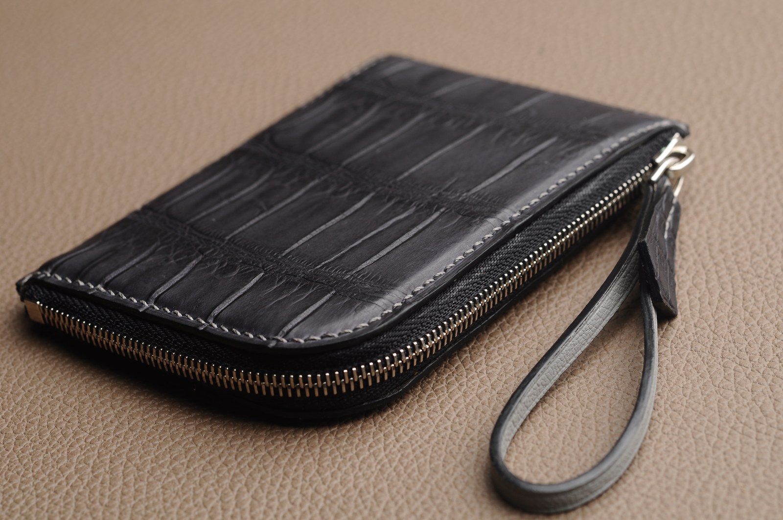 Black crocodile leather zip wallet with wrist strap