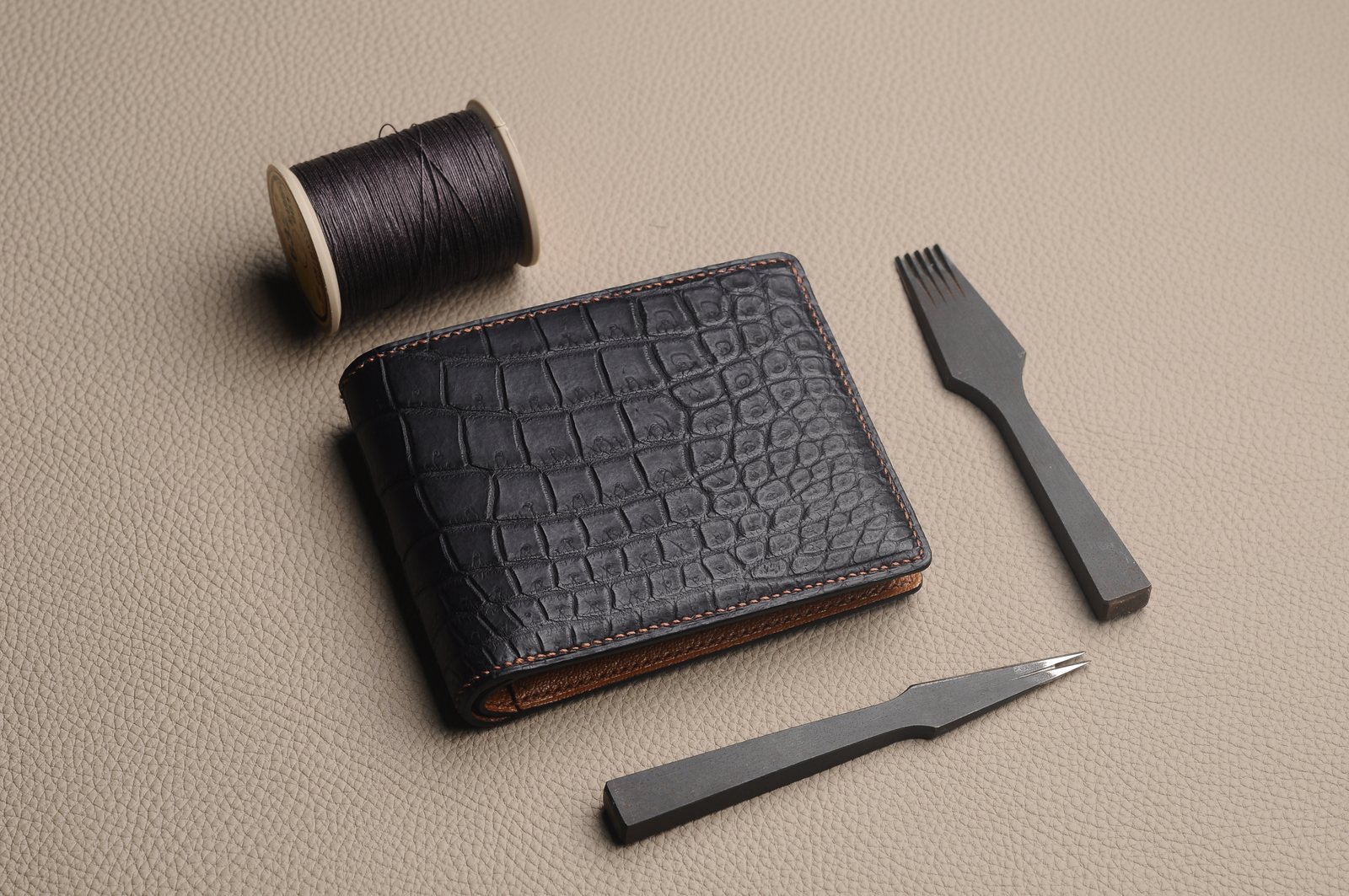 Black long wallet exterior with crocodile texture